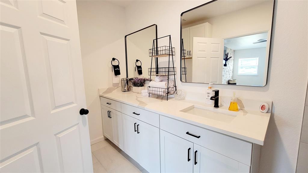 1447 West Lingleville Road Stephenville, TX 76401 - Photo 7 of 12 Bathroom featuring vanity