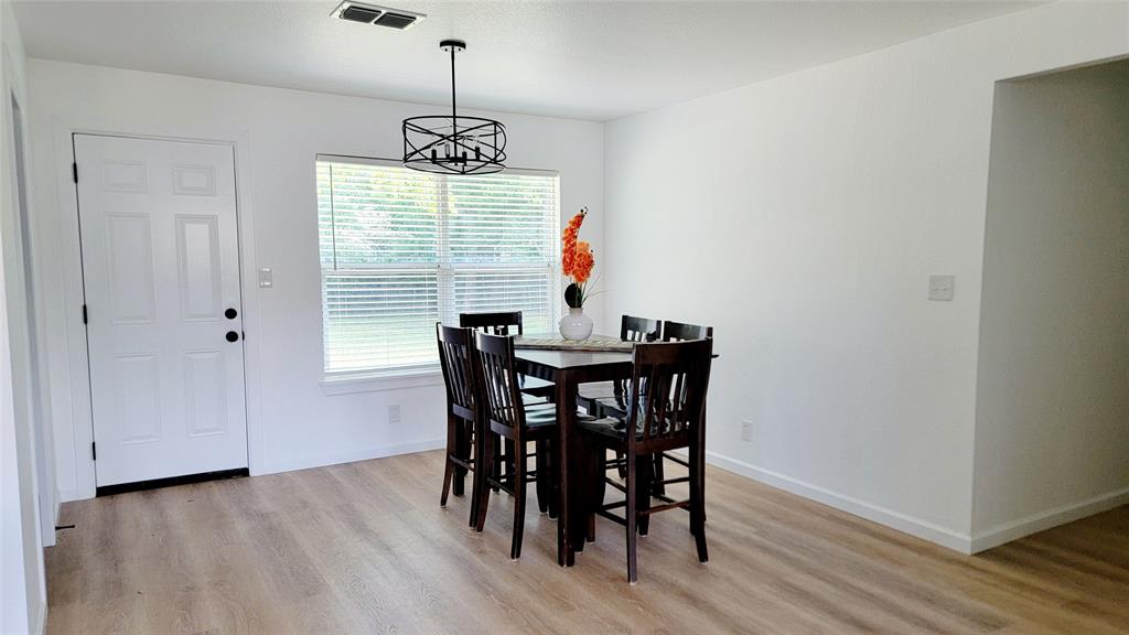 1447 West Lingleville Road Stephenville, TX 76401 - Photo 8 of 12 Dining space featuring light wood finished floors
