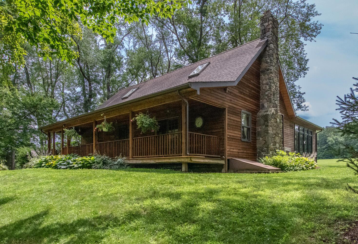 View of property's community featuring a yard
