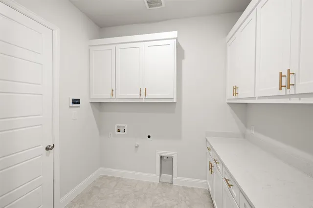 a view of cabinets with wooden floor