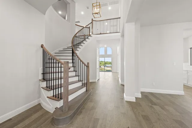 a view of entryway with wooden floor