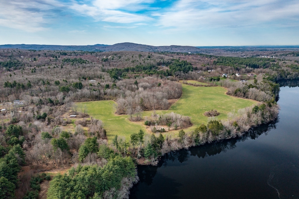 30 Red Bridge Road Wilbraham, MA 01095 - Photo 5 of 6 a view of a lake with a mountain in the back