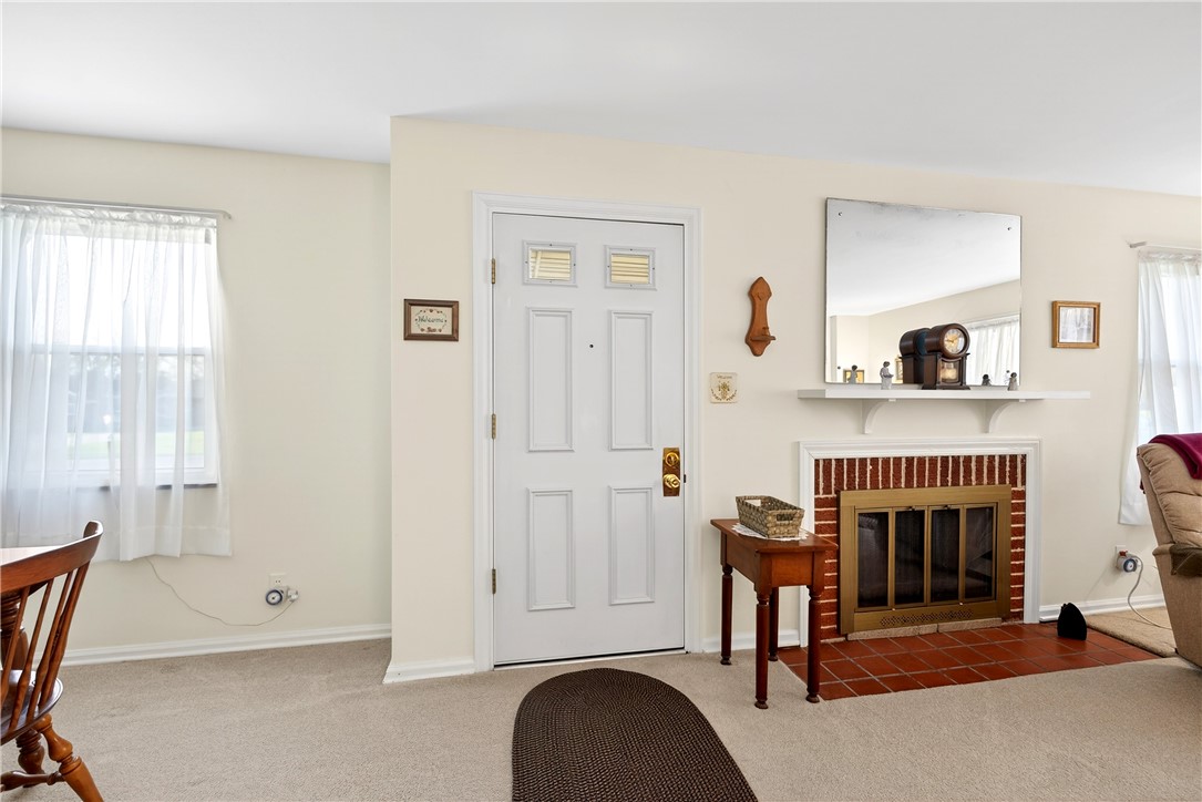 1237 Laurelwood Road Dayton, OH 45409 - Photo 5 of 56 This inviting living area features a cozy fireplace, perfect for relaxing evenings.