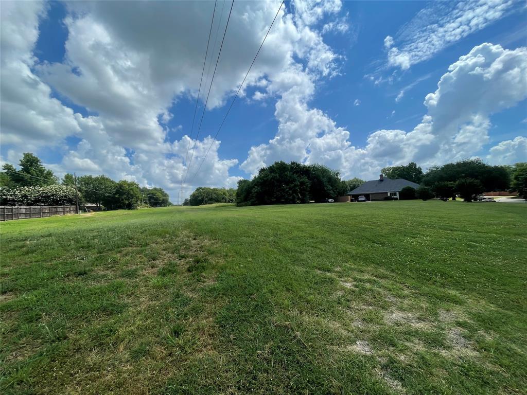 2309 Meadows Lane Sherman, TX 75092 - Photo 7 of 11 a view of a city with lush green forest