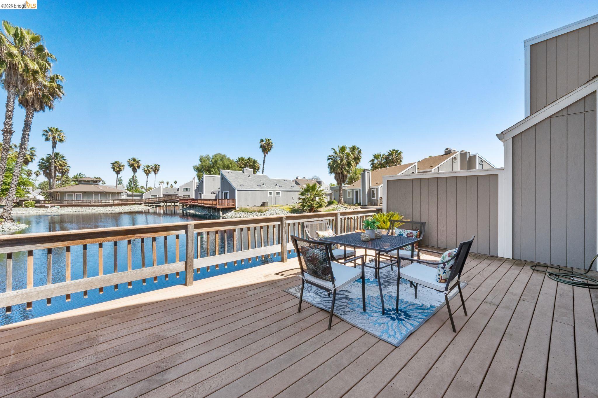 2051 Sand Point Road Discovery Bay, CA 94505 - Photo 11 of 47 Expansive wood-finish deck overlooking a water feature