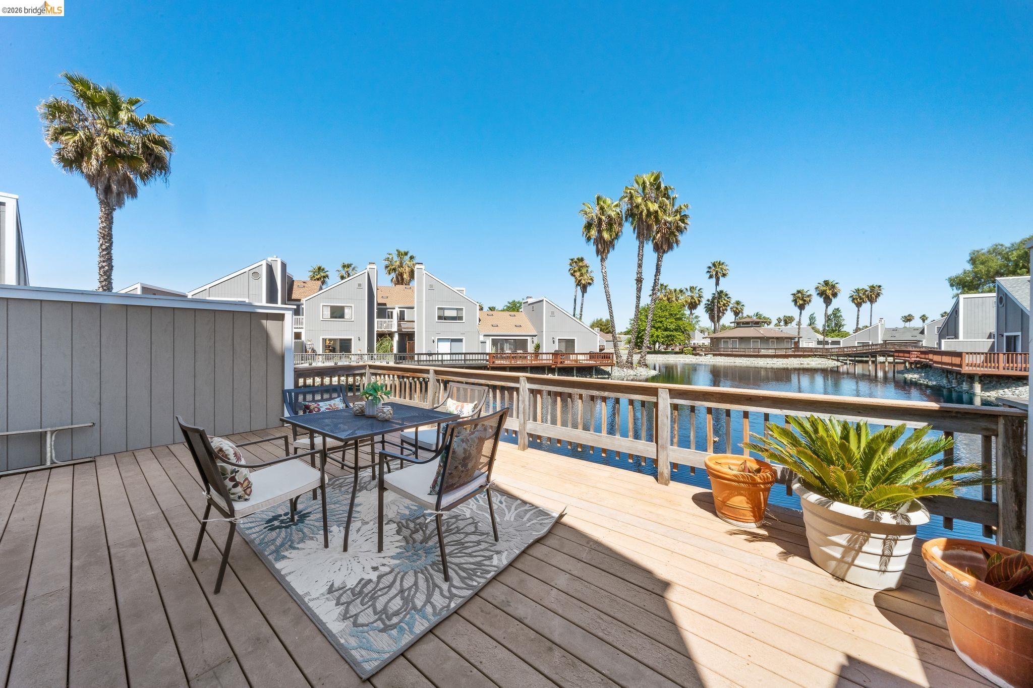 2051 Sand Point Road Discovery Bay, CA 94505 - Photo 12 of 47 Expansive outdoor deck featuring wood flooring and a perimeter railing