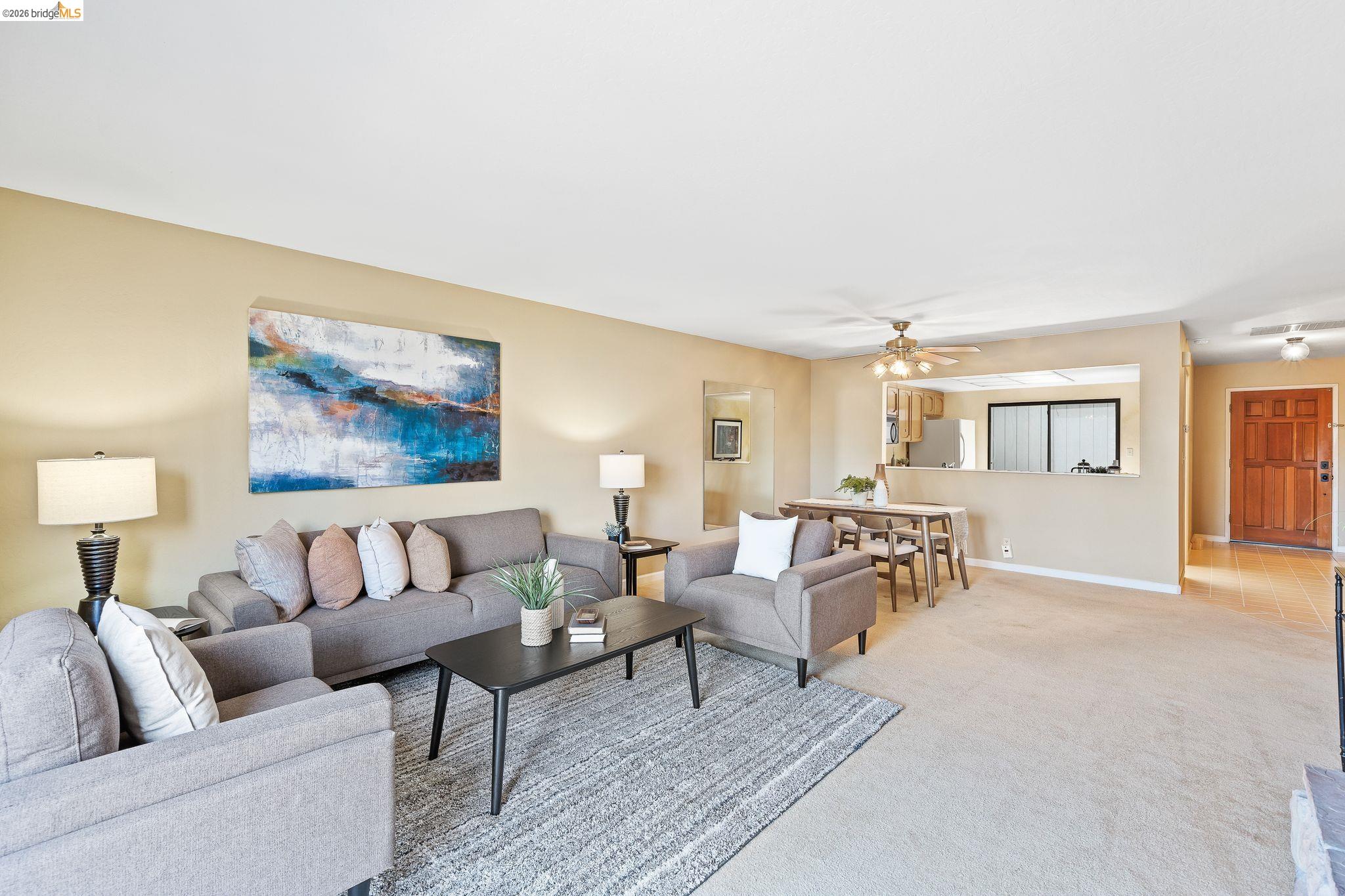 2051 Sand Point Road Discovery Bay, CA 94505 - Photo 14 of 47 Open-concept living area featuring neutral walls and carpeting