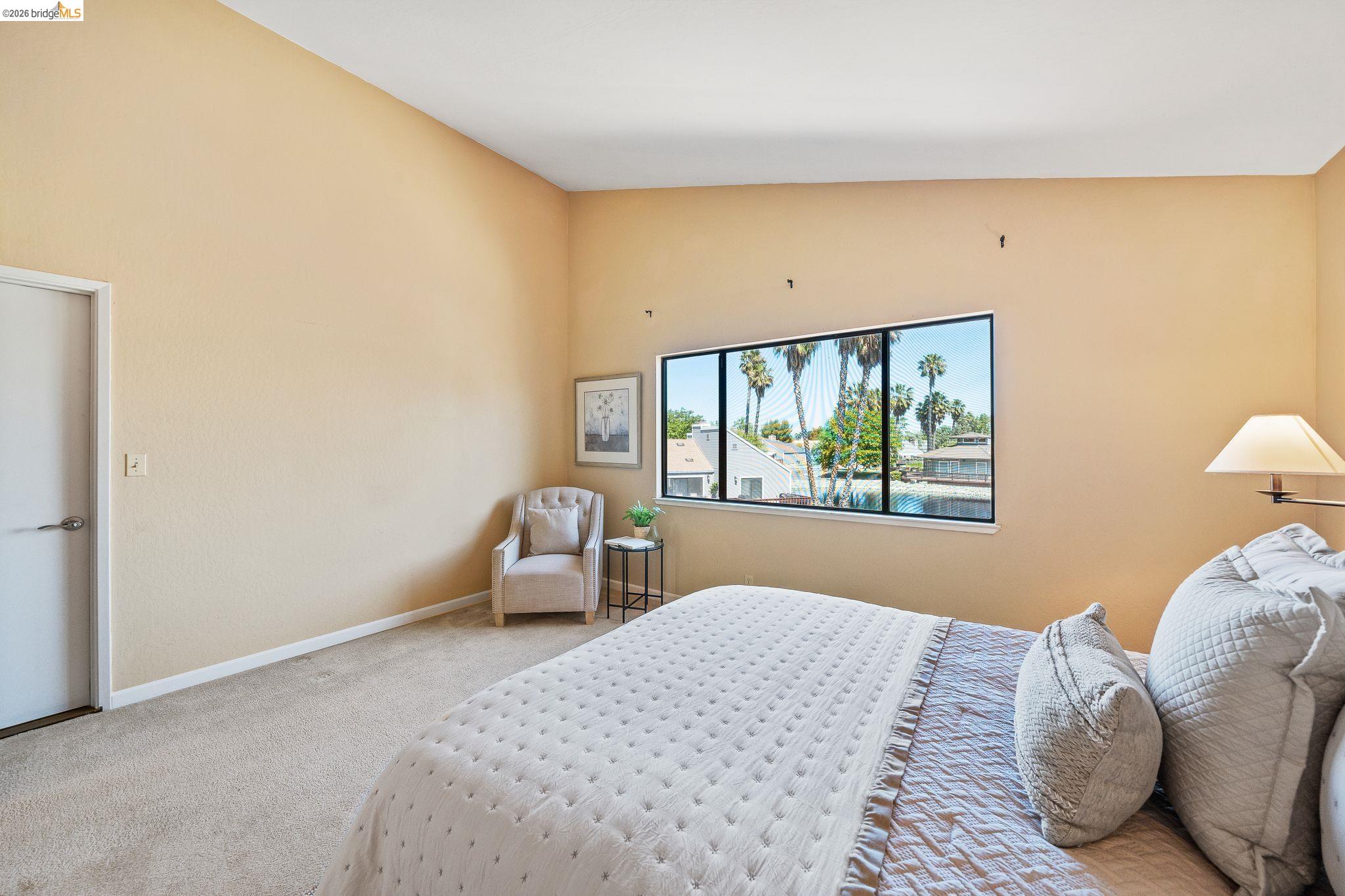 2051 Sand Point Road Discovery Bay, CA 94505 - Photo 26 of 47 Expansive window offering water and palm tree scenery