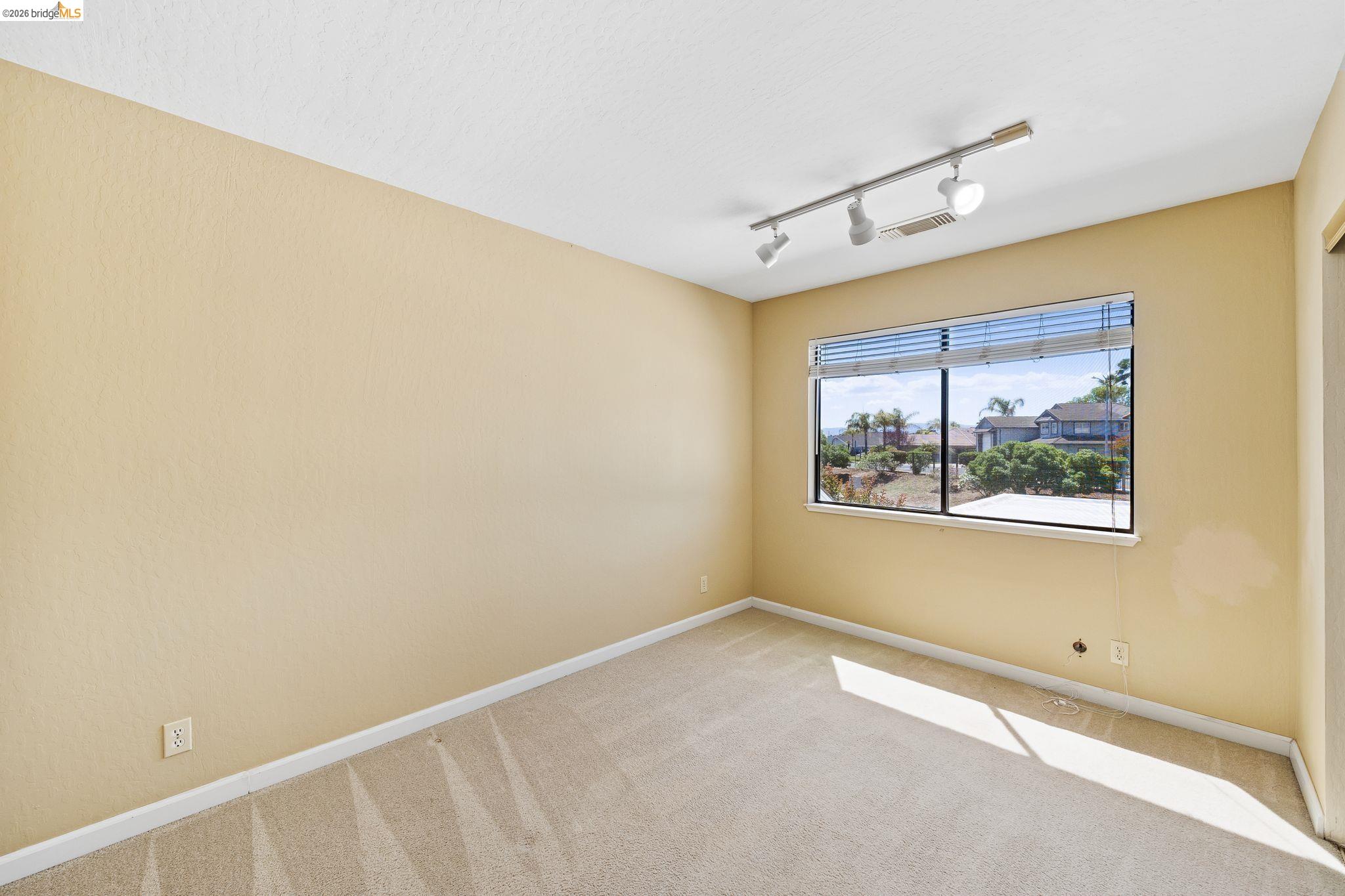 2051 Sand Point Road Discovery Bay, CA 94505 - Photo 33 of 47 Neutral tone walls and light-toned carpeting