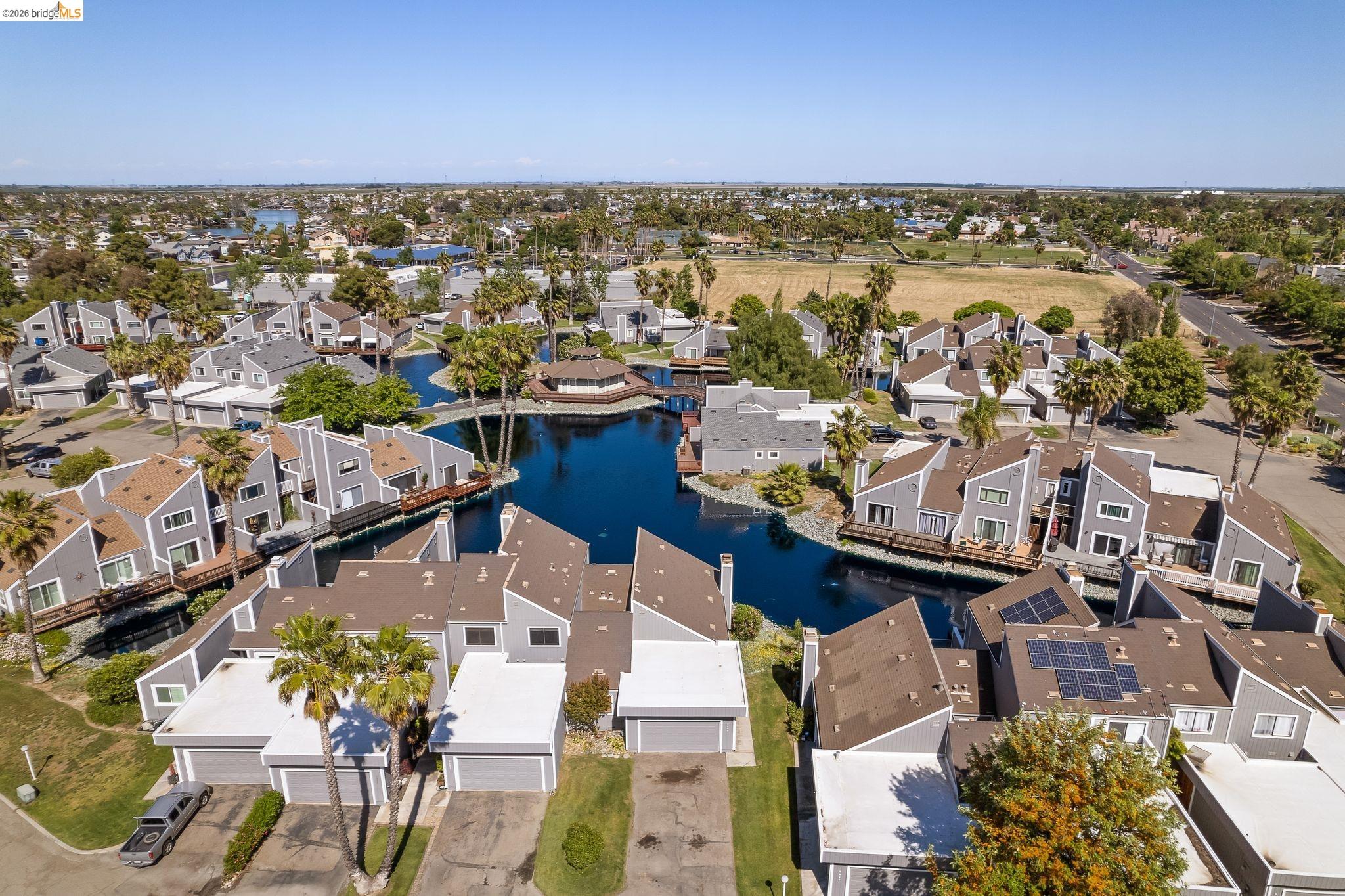 2051 Sand Point Road Discovery Bay, CA 94505 - Photo 40 of 47 Aerial perspective of a multi-unit residential community featuring a central waterway