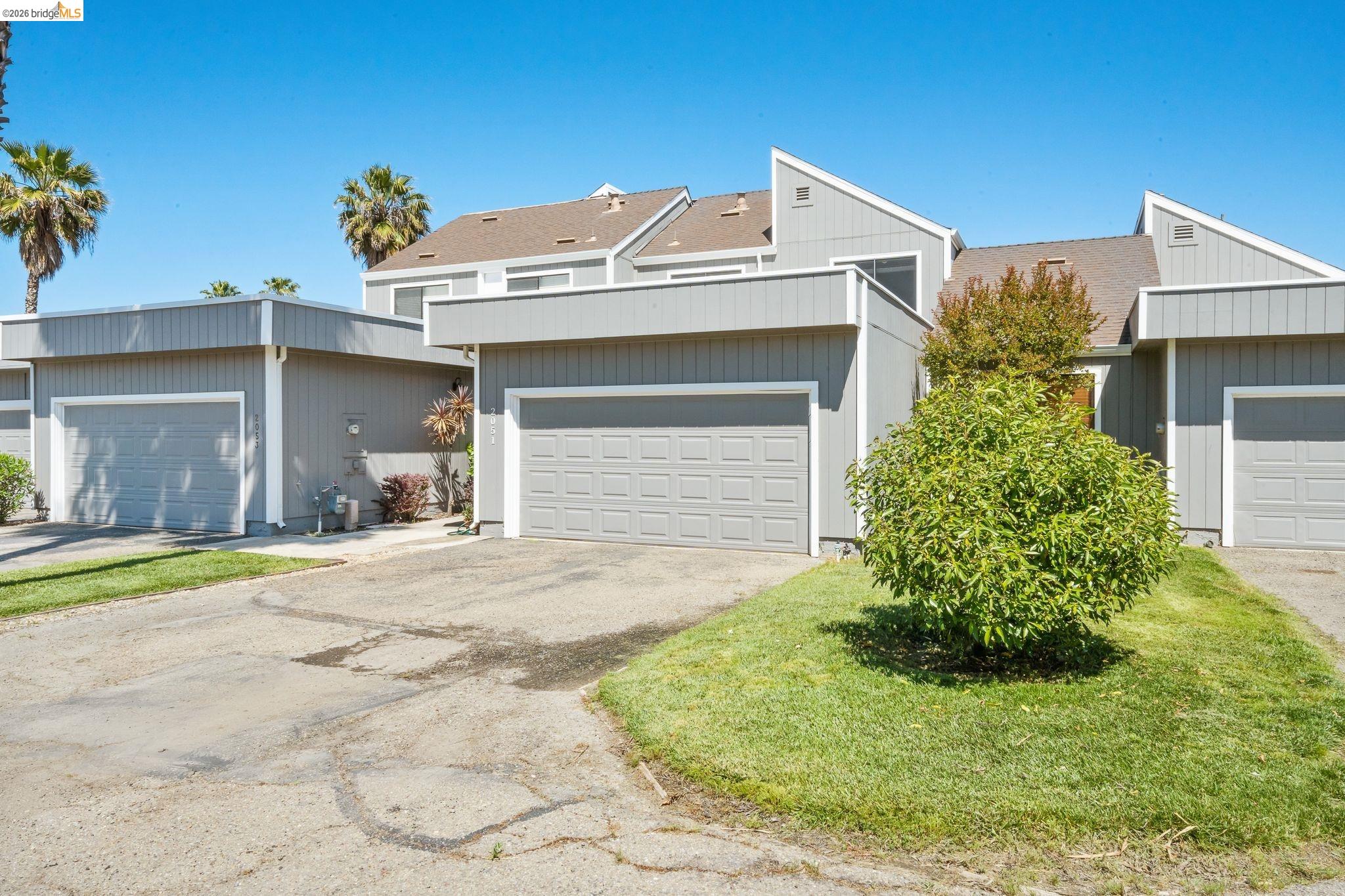 2051 Sand Point Road Discovery Bay, CA 94505 - Photo 4 of 47 Multi-story dwelling featuring grey siding and private garage access