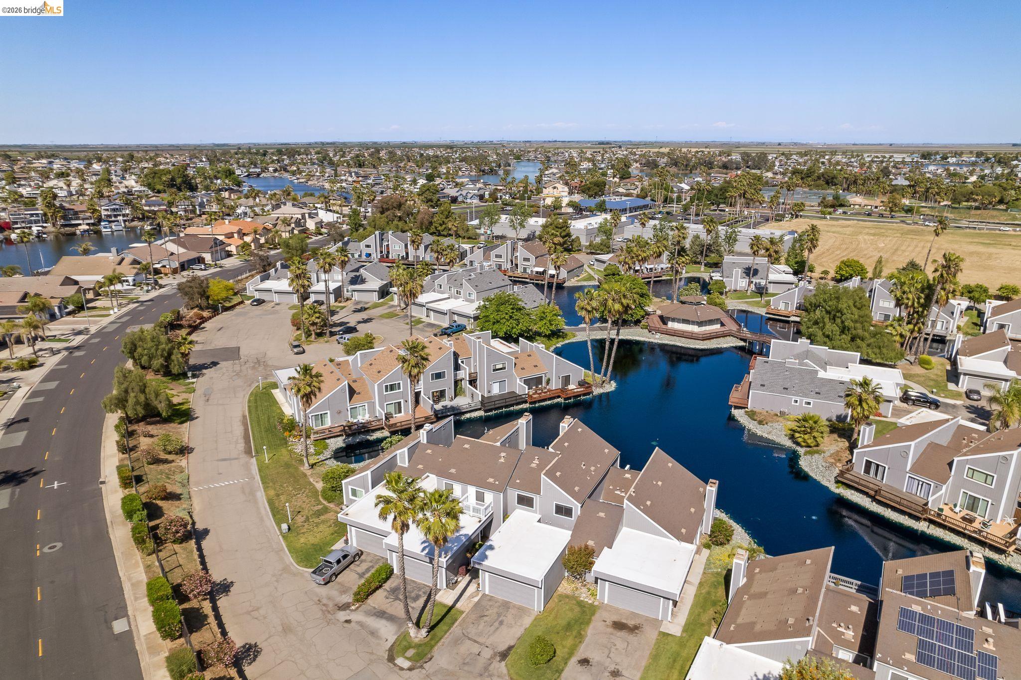 2051 Sand Point Road Discovery Bay, CA 94505 - Photo 46 of 47 Aerial depiction of a residential community featuring waterways and diverse architectural styles