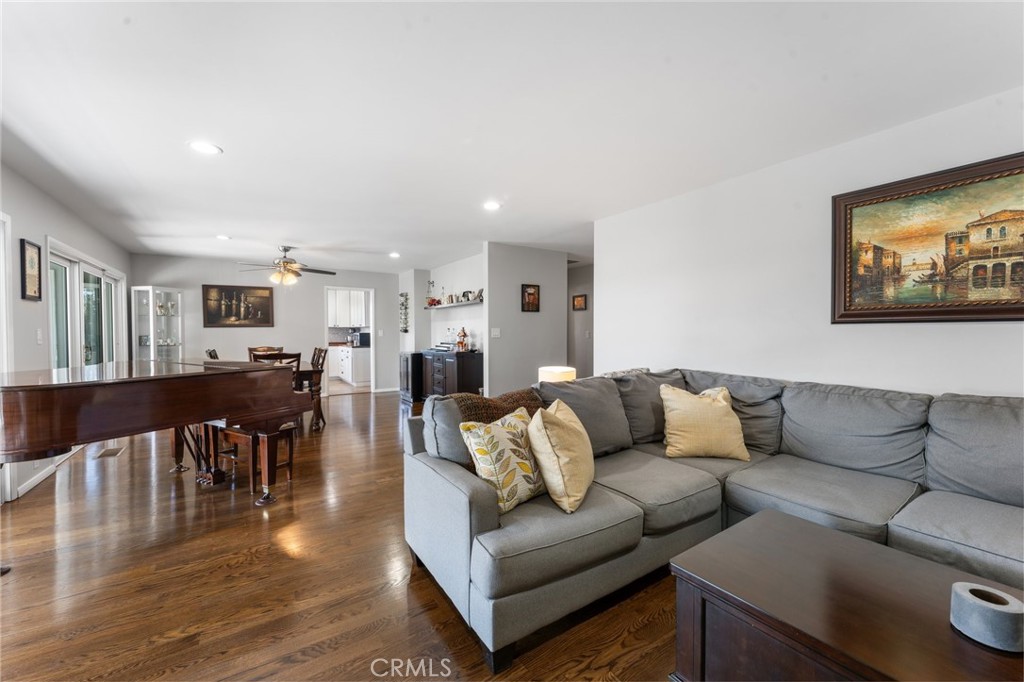 4380 Miramonte Place Riverside, CA 92501 - Photo 11 of 73 a living room with furniture kitchen view and a dining table