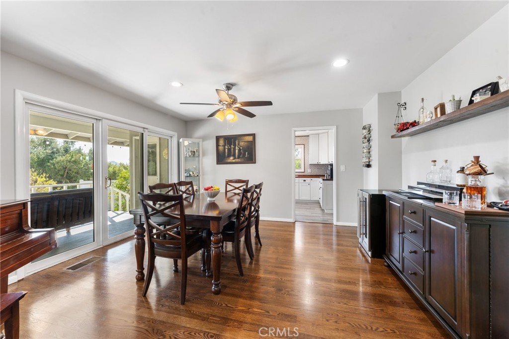 4380 Miramonte Place Riverside, CA 92501 - Photo 12 of 73 a view of a dining room with furniture window and wooden floor