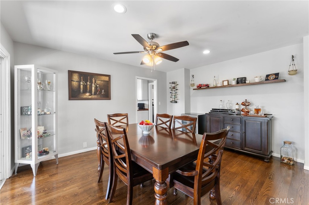 4380 Miramonte Place Riverside, CA 92501 - Photo 13 of 73 a view of a dining room with furniture and wooden floor