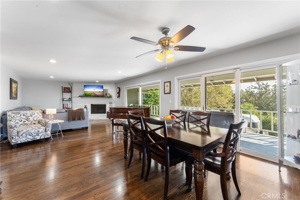 4380 Miramonte Place Riverside, CA 92501 - Photo 14 of 73 a view of a dining room with furniture window and wooden floor