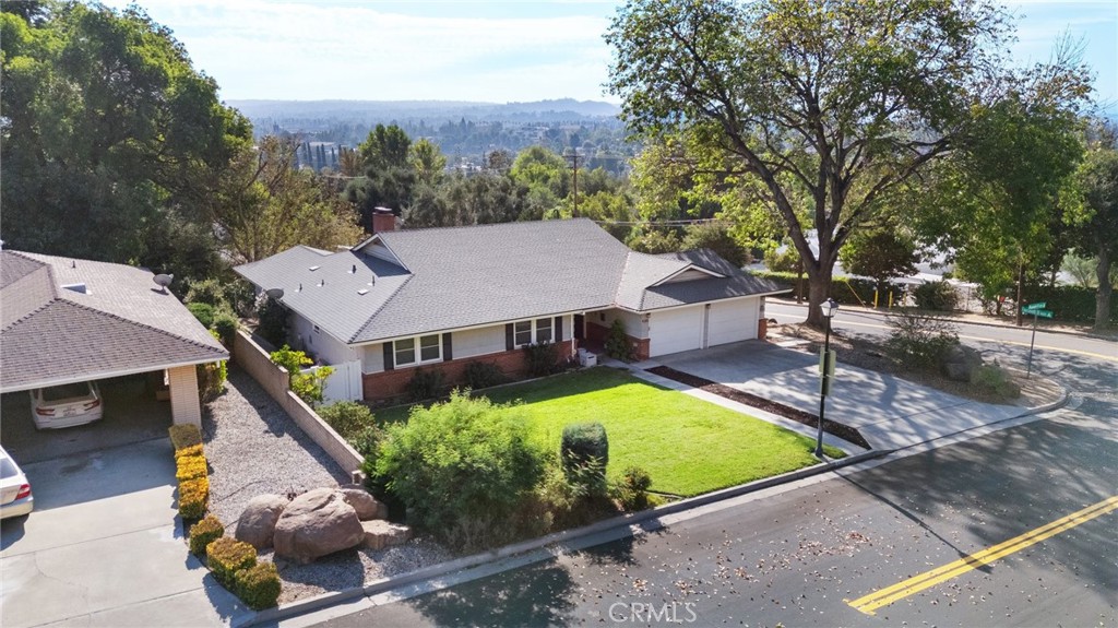 4380 Miramonte Place Riverside, CA 92501 - Photo 2 of 73 an aerial view of a house with a yard basket ball court and outdoor seating
