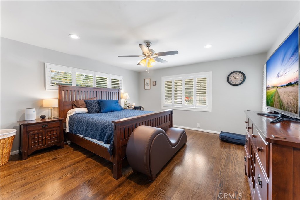4380 Miramonte Place Riverside, CA 92501 - Photo 23 of 73 a bedroom with a bed and a flat screen tv