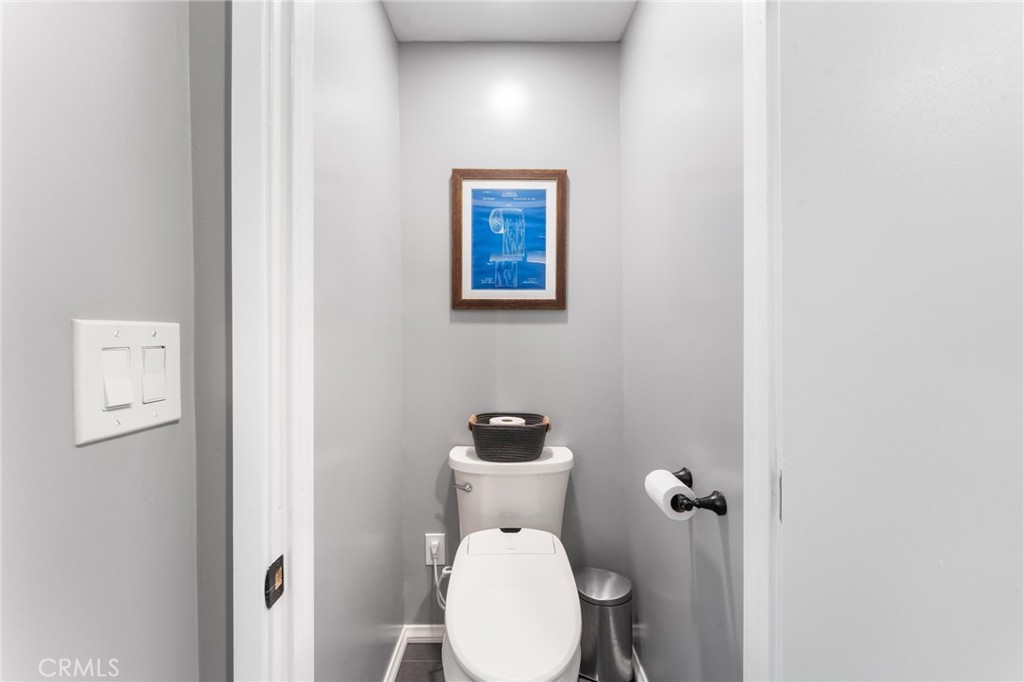 4380 Miramonte Place Riverside, CA 92501 - Photo 28 of 73 a bathroom with a toilet and a sink