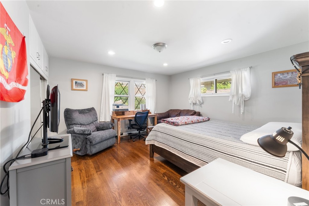 4380 Miramonte Place Riverside, CA 92501 - Photo 29 of 73 a bedroom with furniture and a flat screen tv