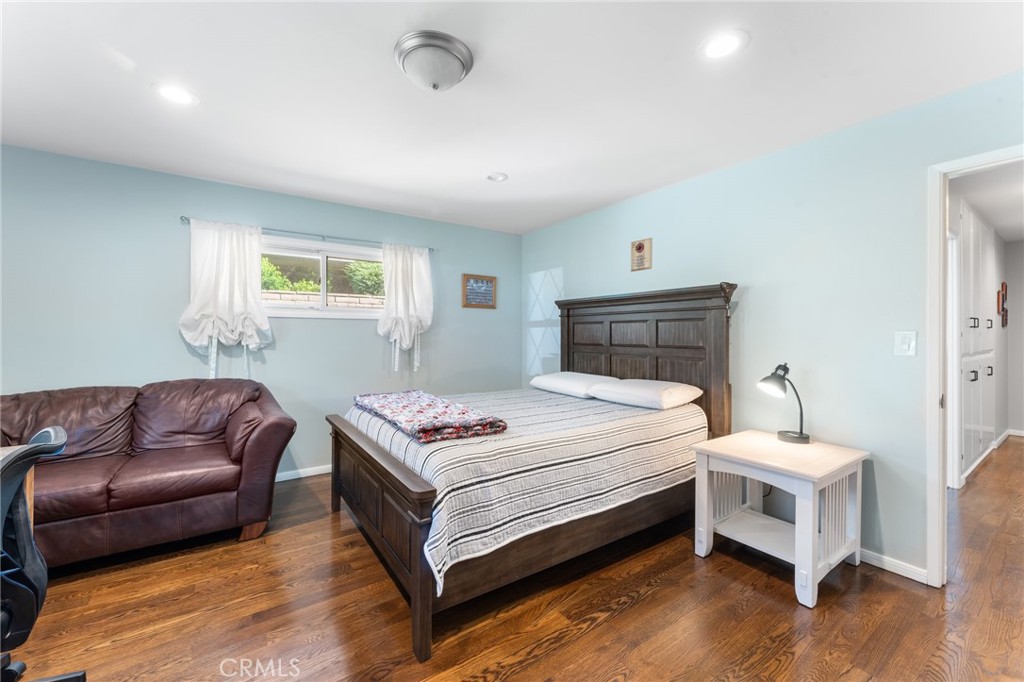 4380 Miramonte Place Riverside, CA 92501 - Photo 30 of 73 a bedroom with a bed and a couch