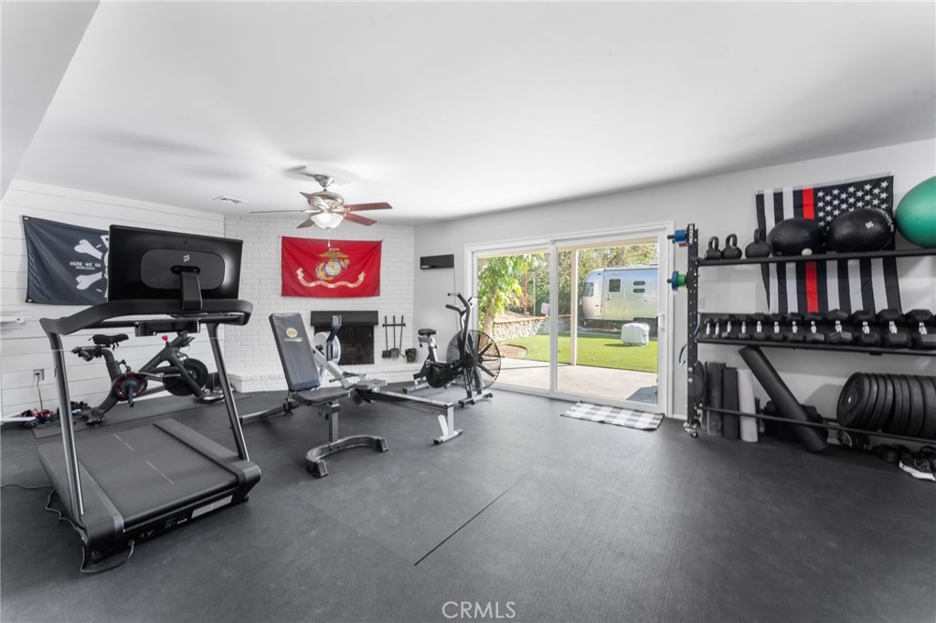 4380 Miramonte Place Riverside, CA 92501 - Photo 36 of 73 a room with gym equipment and a large window