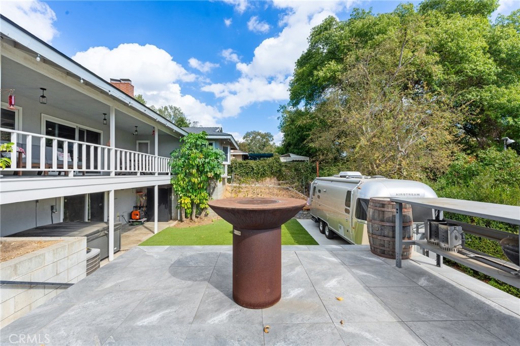 4380 Miramonte Place Riverside, CA 92501 - Photo 48 of 73 a view of a patio with a table and chairs