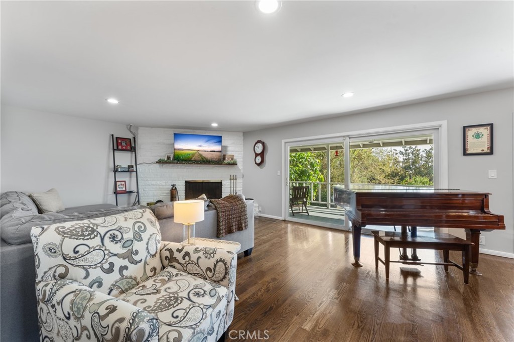4380 Miramonte Place Riverside, CA 92501 - Photo 5 of 73 a living room with furniture and a wooden floor