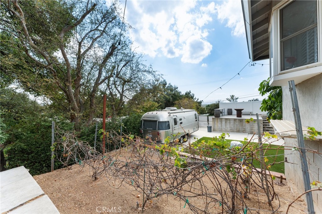4380 Miramonte Place Riverside, CA 92501 - Photo 54 of 73 a view of a patio with table and chairs and potted plants