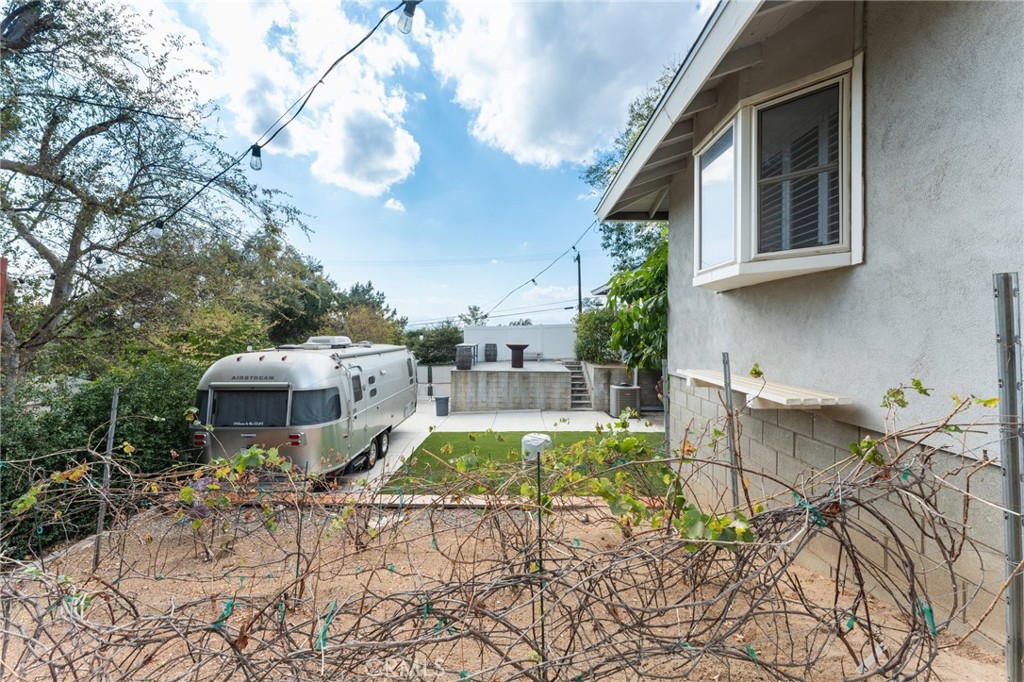 4380 Miramonte Place Riverside, CA 92501 - Photo 55 of 73 a view of a house with pool and sitting area