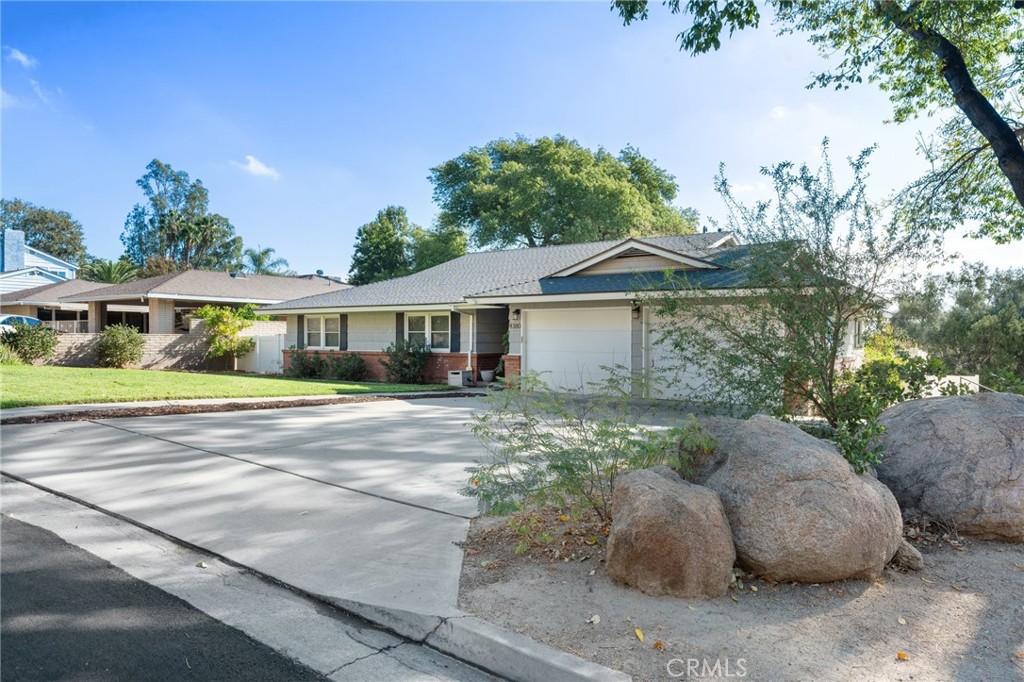 4380 Miramonte Place Riverside, CA 92501 - Photo 58 of 73 a front view of a house with a yard