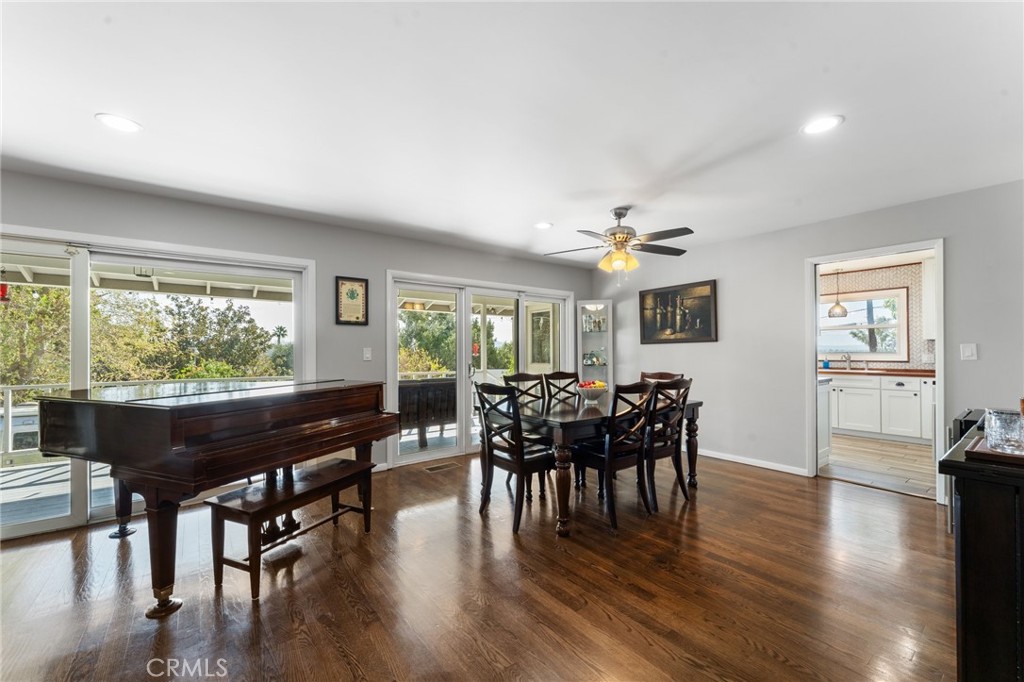 4380 Miramonte Place Riverside, CA 92501 - Photo 6 of 73 a view of a dining room with furniture window and wooden floor
