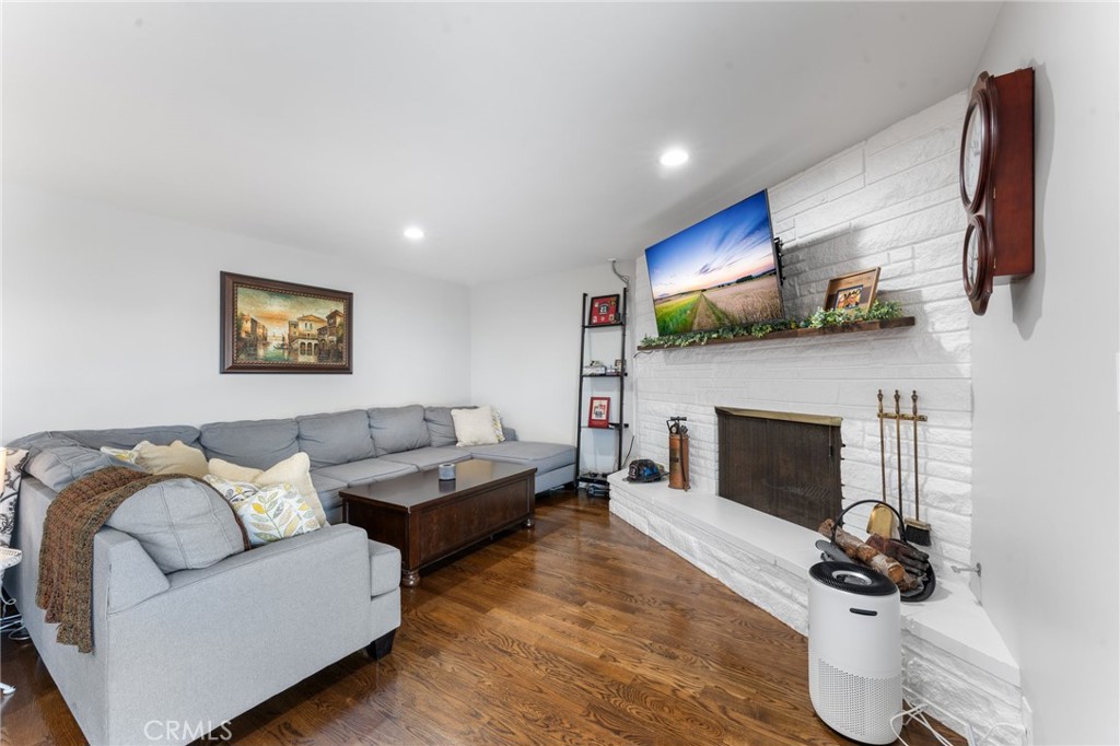 4380 Miramonte Place Riverside, CA 92501 - Photo 9 of 73 a living room with furniture and a fireplace