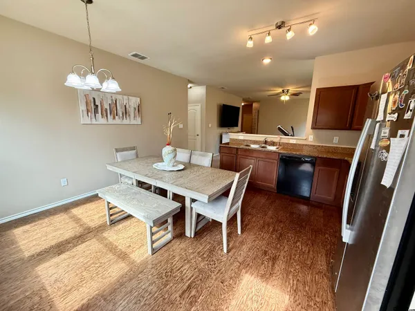 a room with furniture and a flat screen tv