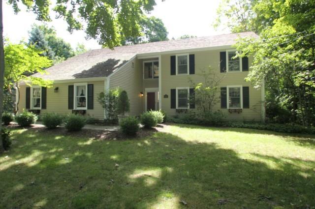 28 Brighton View Road Fairfield, CT 06824 - Photo 1 of 1 a view of a house with a yard