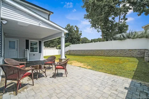 a outdoor seating area with furniture and garden