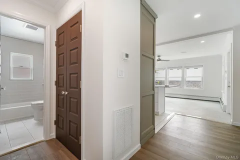 a bathroom with a tub and shower