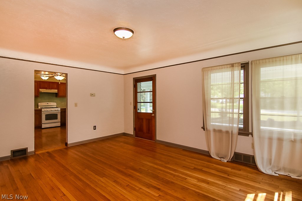 As you come in, you will notice the newly restored wood floors and freshly painted walls.  Welcome!