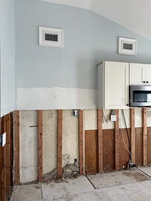 15416 2nd Street East Madeira Beach, FL 33708 - Photo 13 of 16 a view of a utility room with stairs
