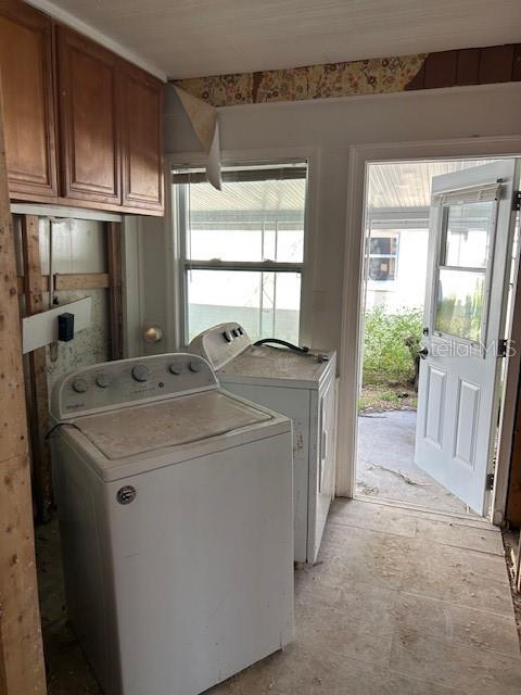 15416 2nd Street East Madeira Beach, FL 33708 - Photo 2 of 16 a utility room with dryer and washer