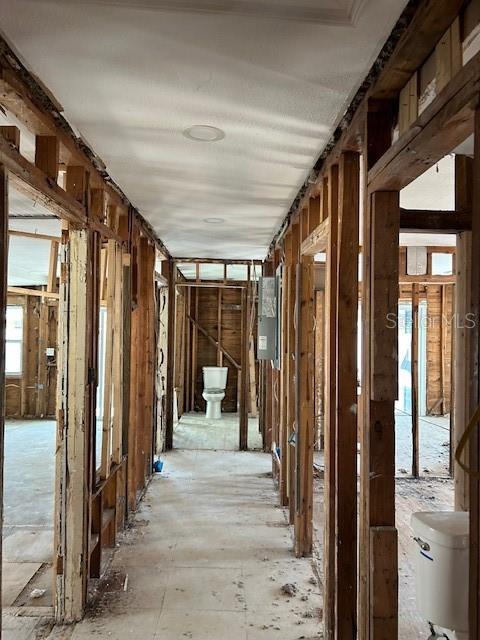 15416 2nd Street East Madeira Beach, FL 33708 - Photo 7 of 16 a view of a hallway with wooden shelves