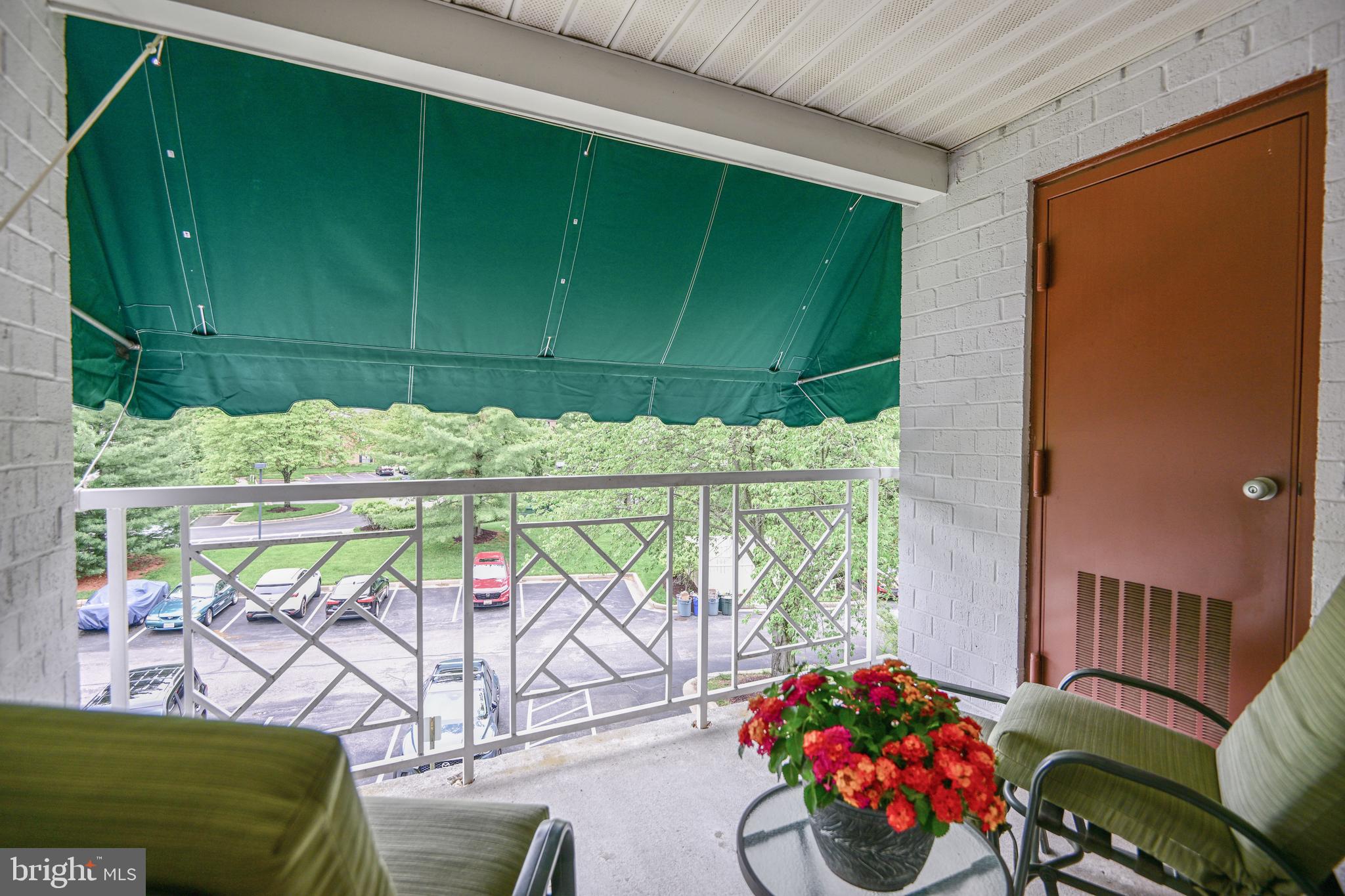 117 Castletown Road, Unit 301 Lutherville-Timonium, MD 21093 - Photo 23 of 23 balcony with awning