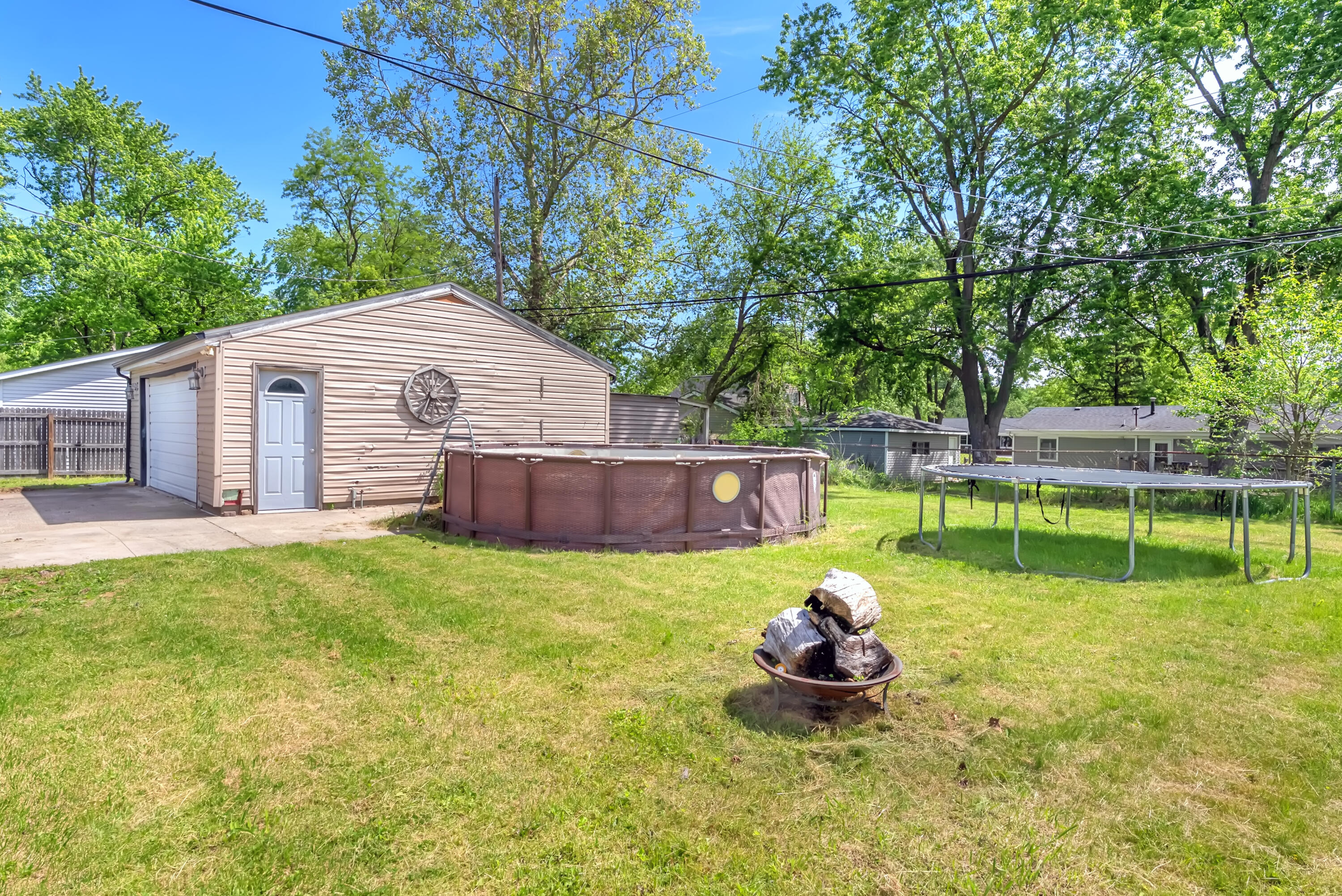 719 Capitol Road Valparaiso, IN 46385 - Photo 23 of 37 a backyard of a house with table and chairs