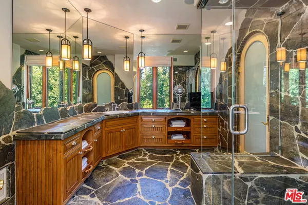 a bath tub sitting next to a bathroom