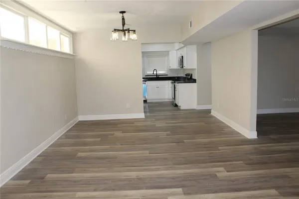 a view of kitchen with wooden floor