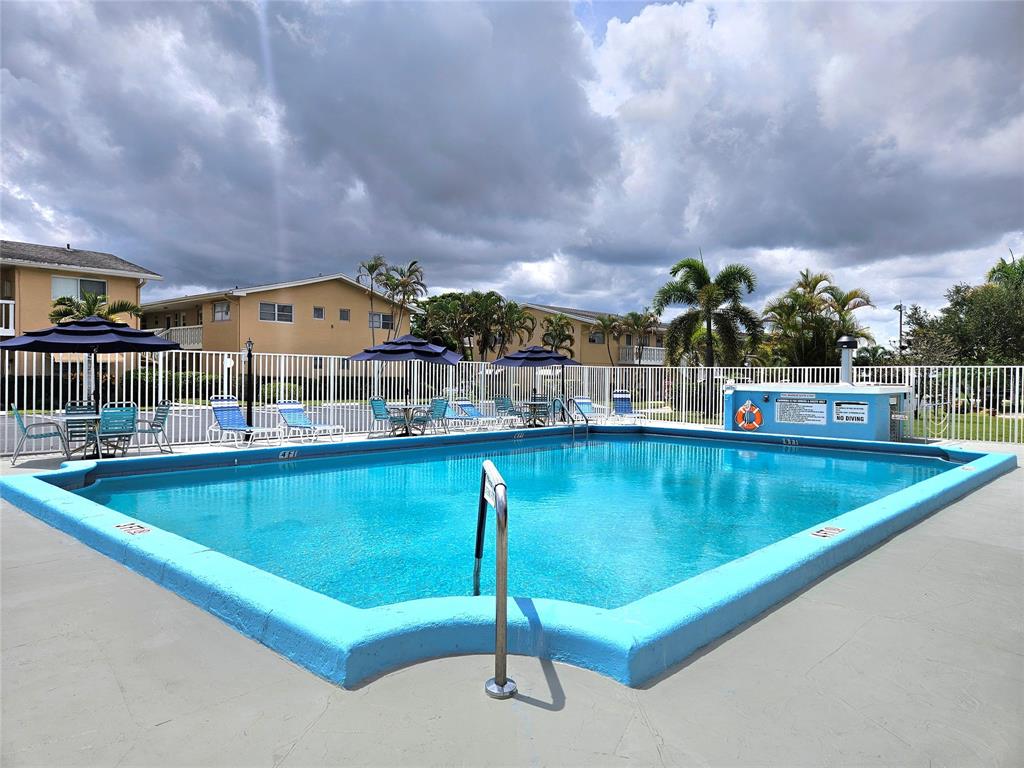 2141 Northeast 1st Court, Unit 201 Boynton Beach, FL 33435 - Photo 19 of 26 a view of swimming pool