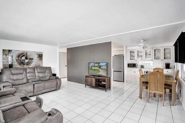 a living room with furniture and a table