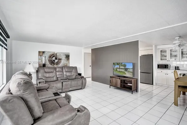 a living room with furniture and a couch
