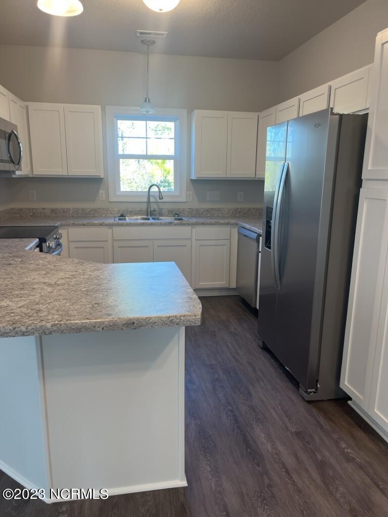 2017 Folkstone Road Holly Ridge, NC 28445 - Photo 9 of 29 1703005813a1ef6823976e4f2e8948c49e2833ab