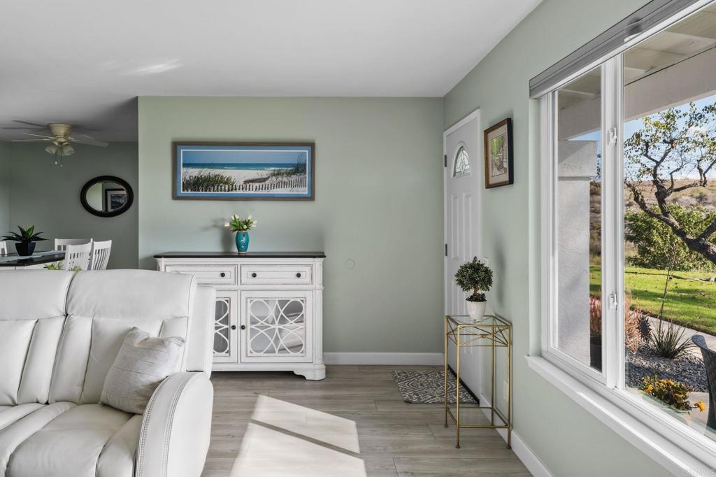 3757 Dearborn Street Oceanside, CA 92057 - Photo 11 of 33 a living room with furniture and wooden floor